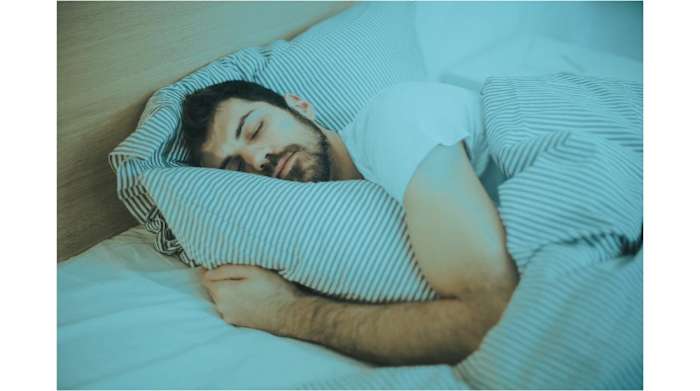 Man Sleeping On Mattress